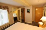 Twin Bedroom with Two Beds Next to Full Bath in Condo at Waterville Valley